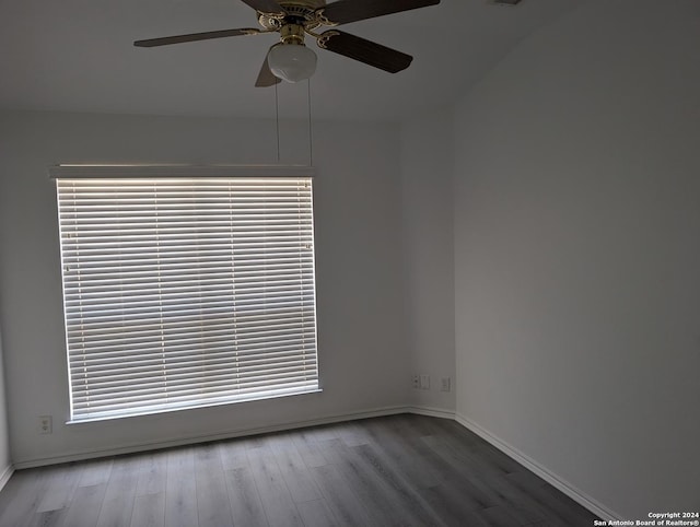 spare room featuring ceiling fan and wood-type flooring