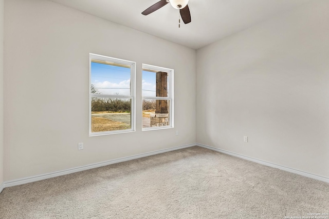 unfurnished room featuring ceiling fan, baseboards, and carpet flooring