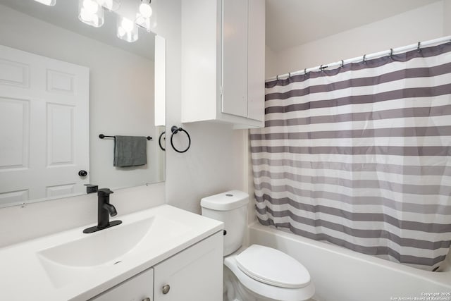 full bathroom with toilet, vanity, and shower / bath combination with curtain