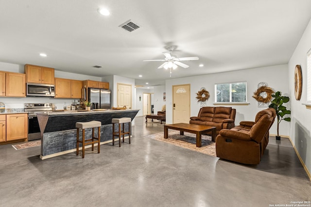 living room featuring ceiling fan