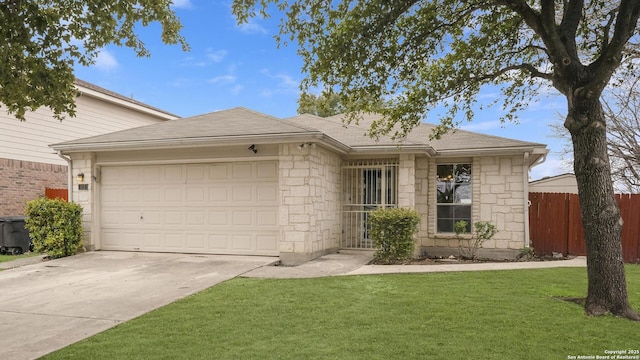 ranch-style house with fence, driveway, stone siding, a garage, and a front lawn