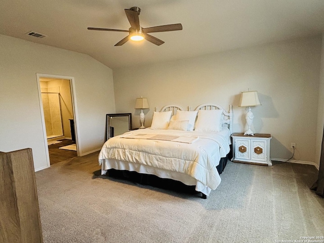 carpeted bedroom with lofted ceiling, visible vents, ceiling fan, and baseboards