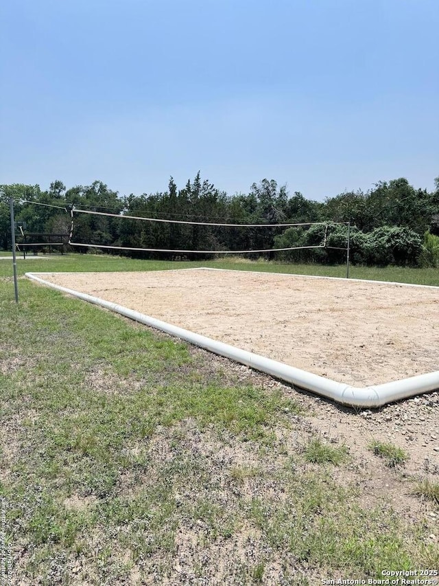 surrounding community featuring volleyball court