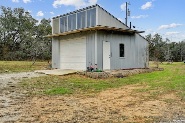 garage featuring driveway