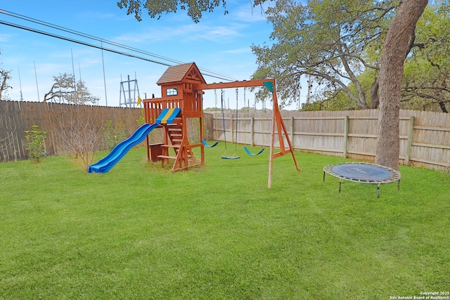4114 Luckenbach, San Antonio, TX 78251 - view of play area with a fenced backyard, a trampoline, and a yard