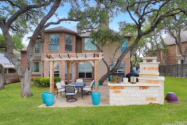 4114 Luckenbach, San Antonio, TX 78251 - back of property featuring a patio, brick siding, a lawn, and a pergola