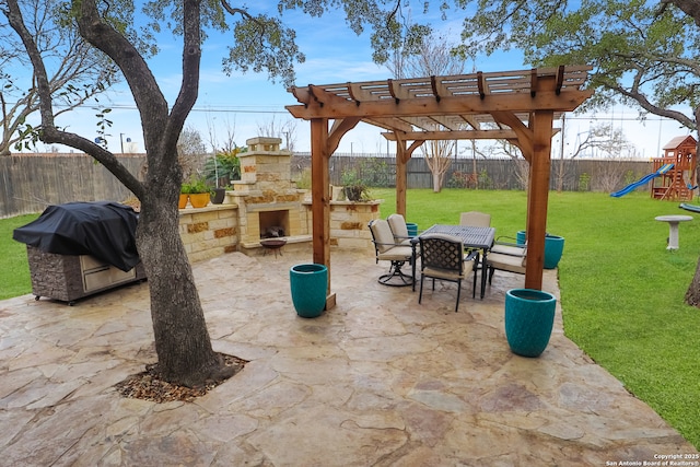 4114 Luckenbach, San Antonio, TX 78251 - view of patio / terrace featuring a fenced backyard, an outdoor stone fireplace, a playground, and outdoor dining space