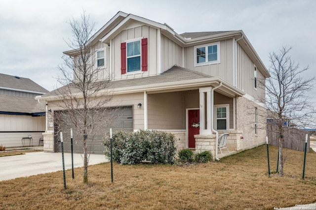 view of front facade with a garage, driveway, board and batten siding, and a front yard