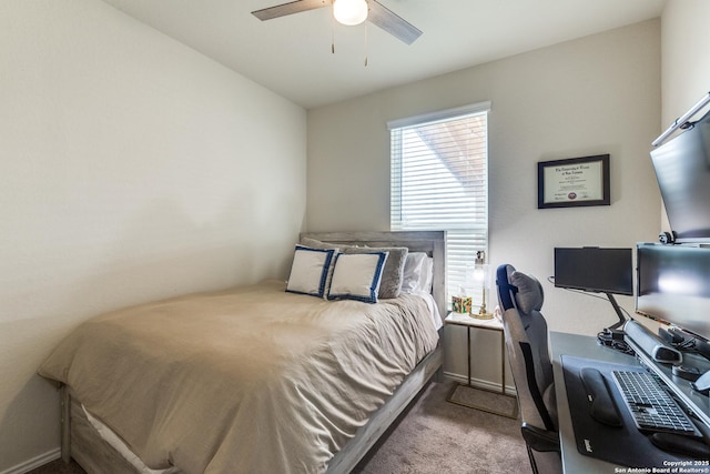 bedroom with a ceiling fan and light colored carpet