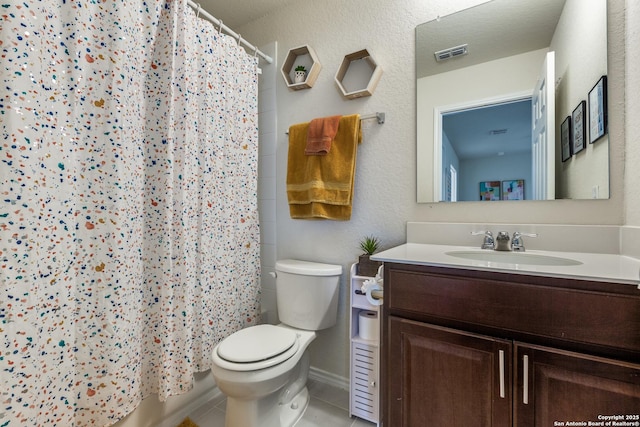 bathroom with tile patterned flooring, toilet, vanity, visible vents, and a shower with curtain