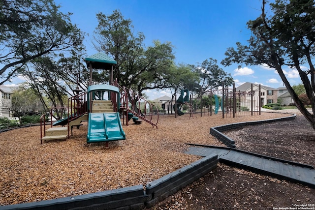 community playground featuring a residential view