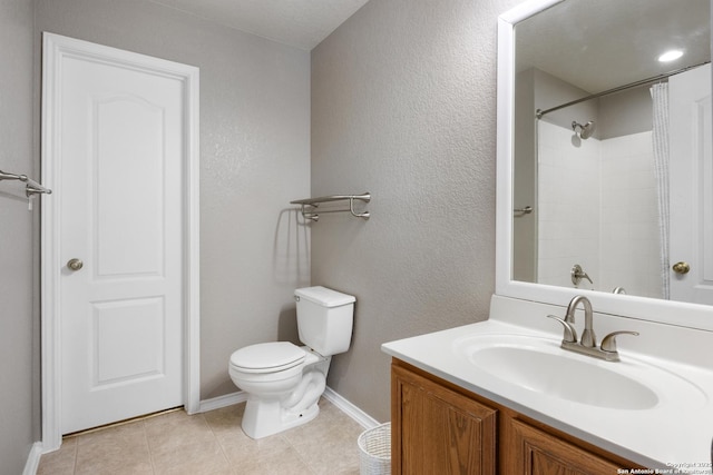 full bath featuring a textured wall, toilet, a shower with shower curtain, vanity, and tile patterned floors