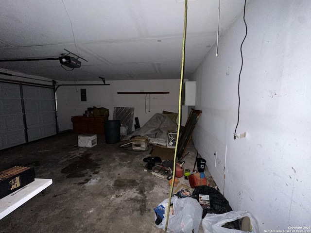 204 Dogwood Ln, Kountze, TX 77625 - garage featuring electric panel and a garage door opener