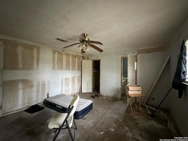 204 Dogwood Ln, Kountze, TX 77625 - interior space featuring a textured ceiling, ceiling fan, and visible vents