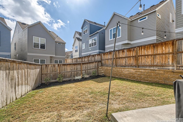 view of yard featuring a fenced backyard