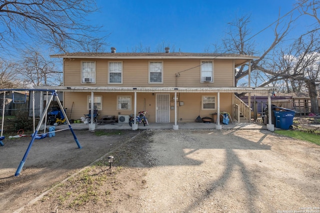 rear view of property with a patio