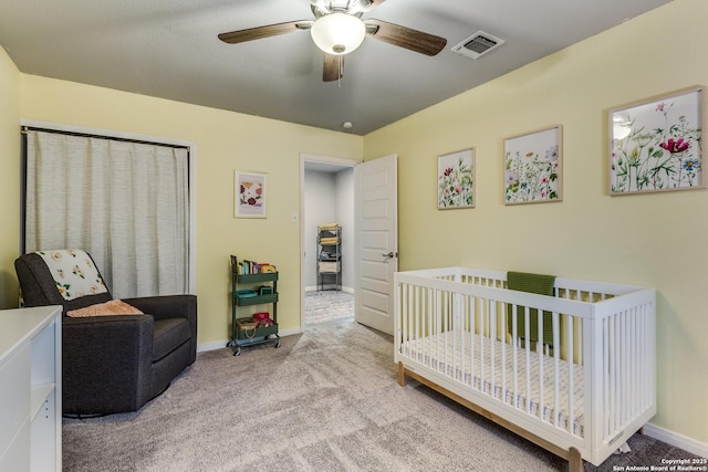 bedroom featuring carpet floors, visible vents, ceiling fan, and baseboards