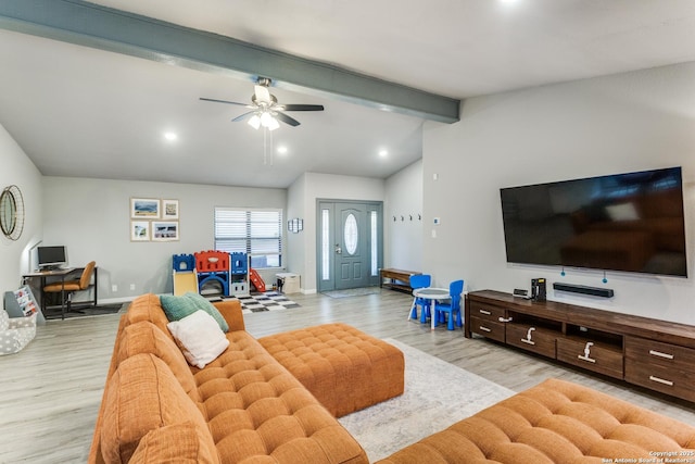 living area with vaulted ceiling with beams, light wood-style flooring, and baseboards