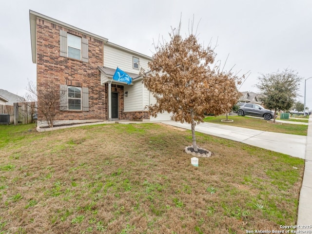 view of front of property featuring concrete driveway, fence, cooling unit, a front lawn, and brick siding