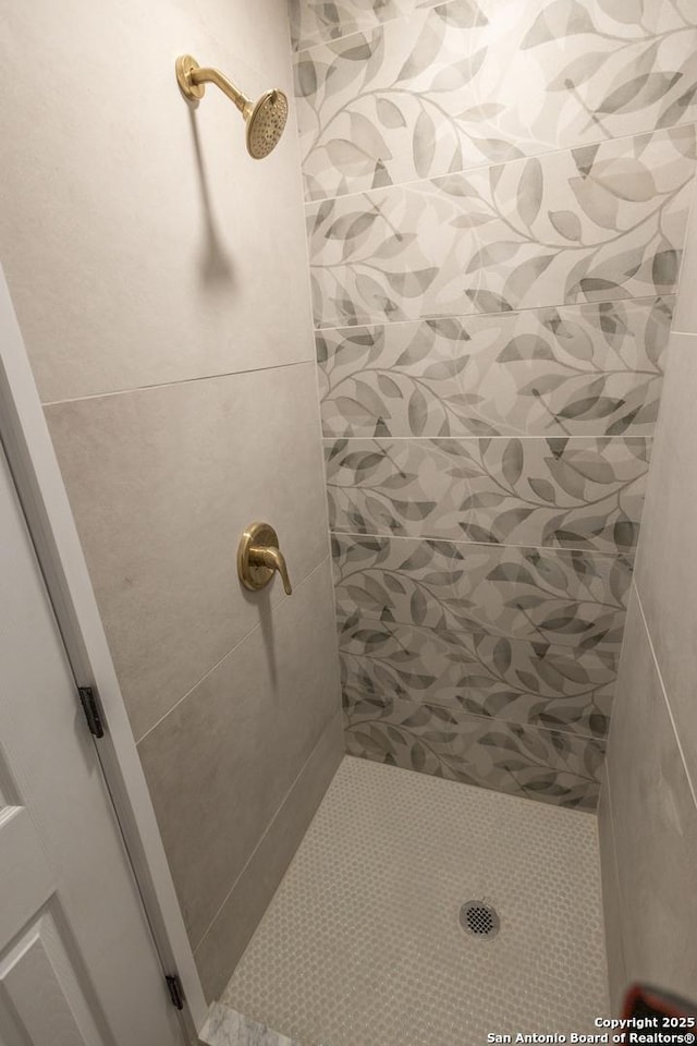 bathroom featuring a stall shower