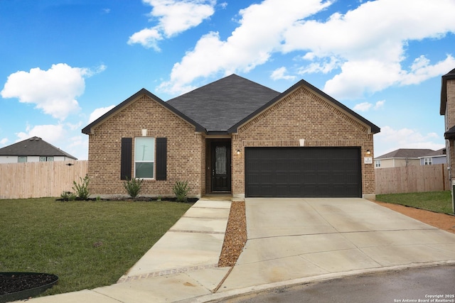 ranch-style house featuring a garage, driveway, fence, and a front yard