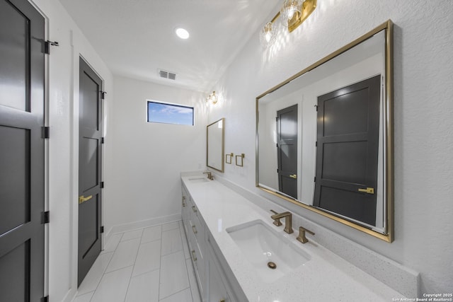 31047 Windmill Ln, Bulverde, TX 78163 - full bath with double vanity and tile patterned flooring