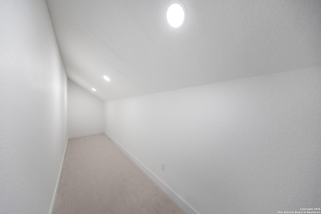 31047 Windmill Ln, Bulverde, TX 78163 - bonus room with vaulted ceiling, baseboards, light colored carpet, and recessed lighting