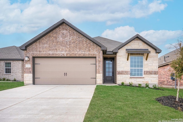 view of front of house featuring concrete driveway, stone siding, an attached garage, a front yard, and brick siding