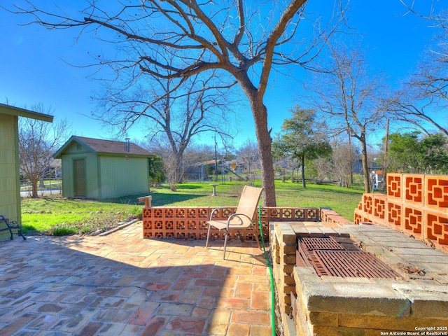 view of patio with an outdoor structure and a shed