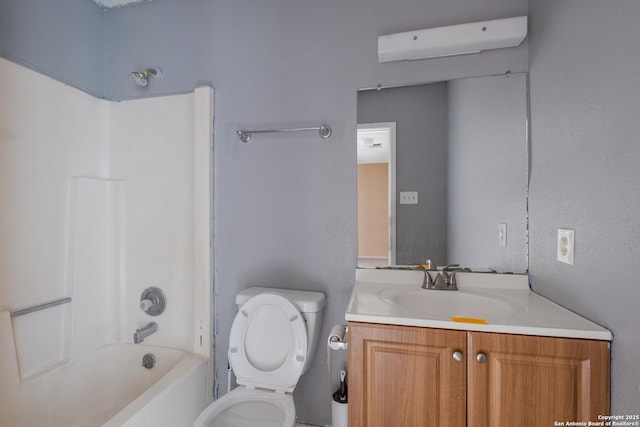 full bathroom featuring vanity, toilet, and bathing tub / shower combination