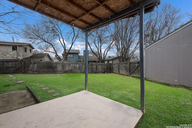 view of yard featuring a patio area and a fenced backyard