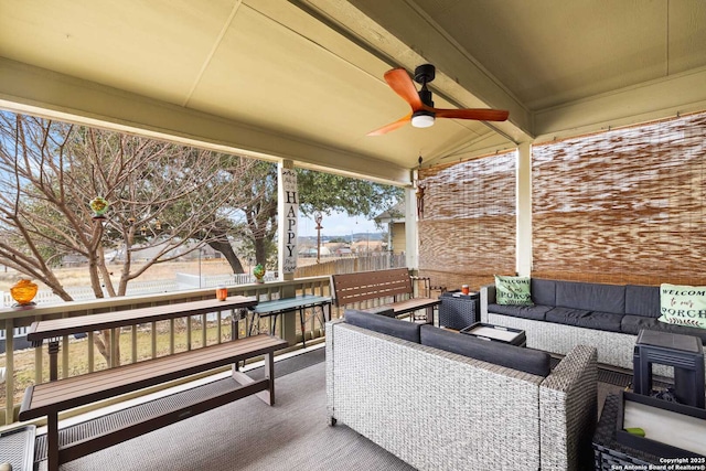 view of patio with an outdoor hangout area and a ceiling fan