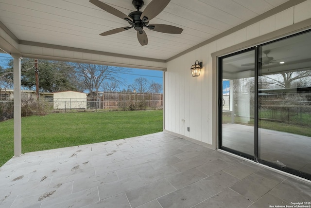 view of patio / terrace with a fenced backyard and a ceiling fan