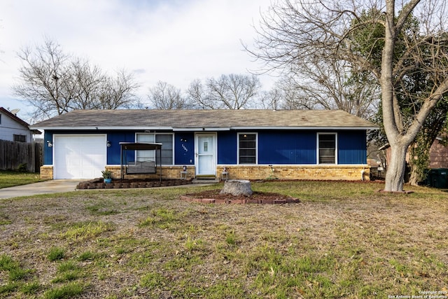 ranch-style home with a front lawn, concrete driveway, brick siding, and an attached garage