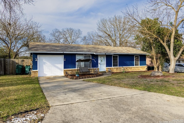 single story home featuring a garage, driveway, brick siding, and a front lawn