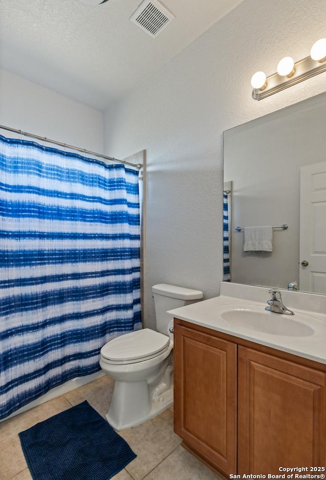 full bath featuring visible vents, toilet, curtained shower, tile patterned flooring, and vanity