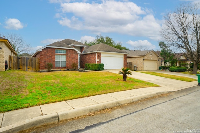 ranch-style home with a garage, driveway, brick siding, and a front yard