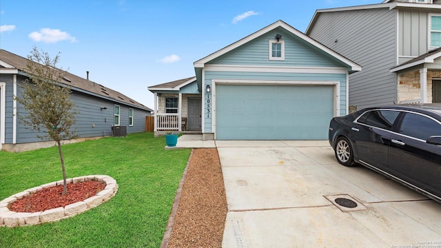 view of front of house with a porch, an attached garage, cooling unit, driveway, and a front lawn