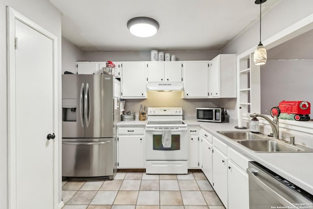 kitchen featuring appliances with stainless steel finishes, light countertops, under cabinet range hood, white cabinetry, and a sink