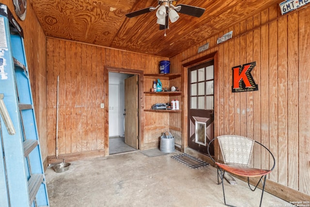 doorway to property with a ceiling fan