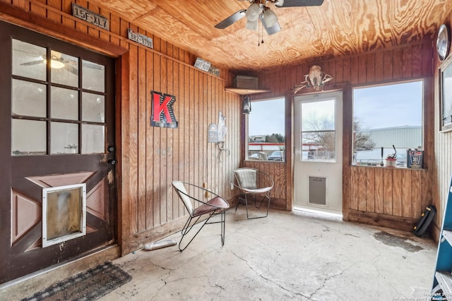 interior space featuring a ceiling fan