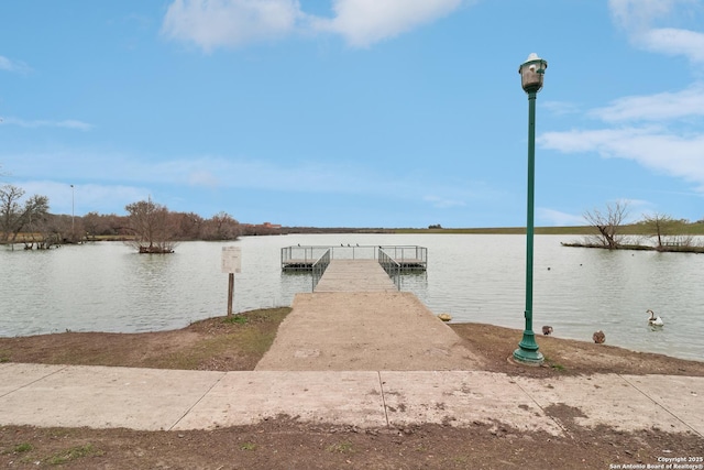 view of dock with a water view