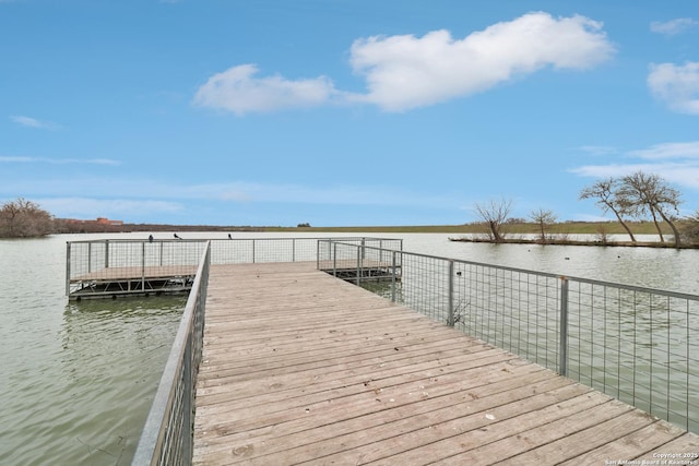 view of dock with a water view