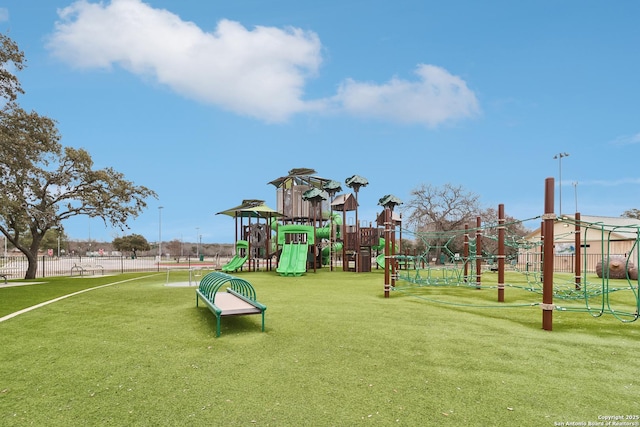 community jungle gym with fence