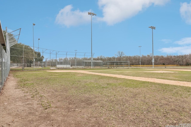 view of property's community featuring volleyball court and fence