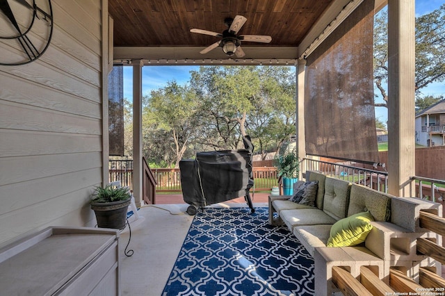 view of patio / terrace featuring ceiling fan, an outdoor living space, and grilling area