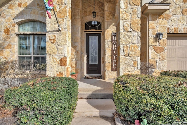 view of exterior entry with stone siding