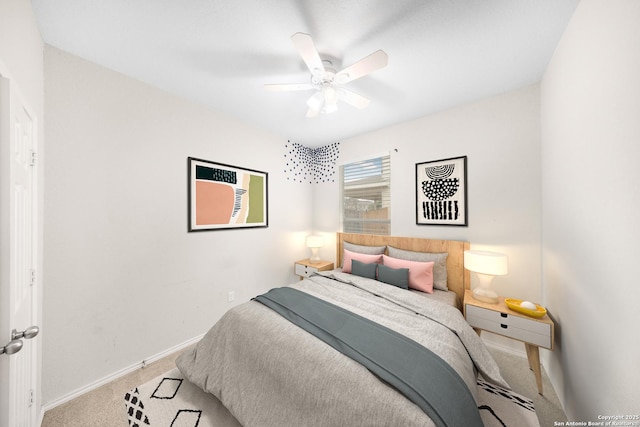 carpeted bedroom featuring ceiling fan, a baseboard radiator, and baseboards