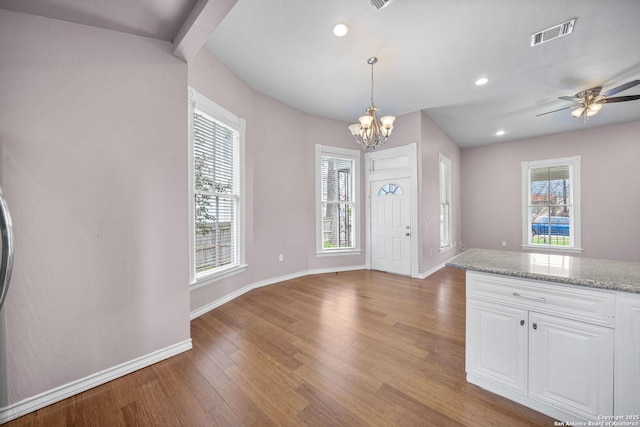 foyer entrance featuring recessed lighting, visible vents, light wood-style flooring, and baseboards