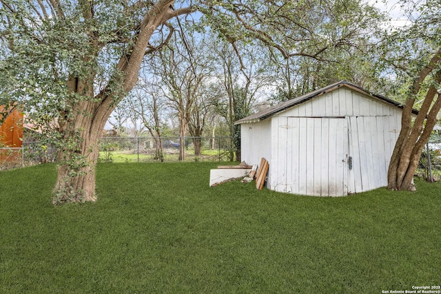 view of shed with fence